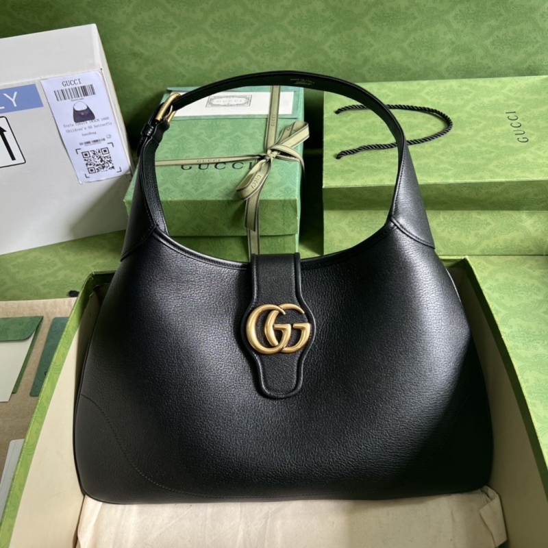 G*u*i top handle bags